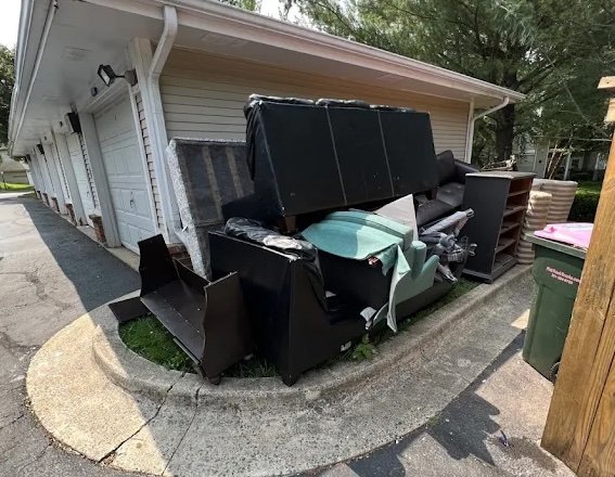 clearing out bulky furniture from storage shed